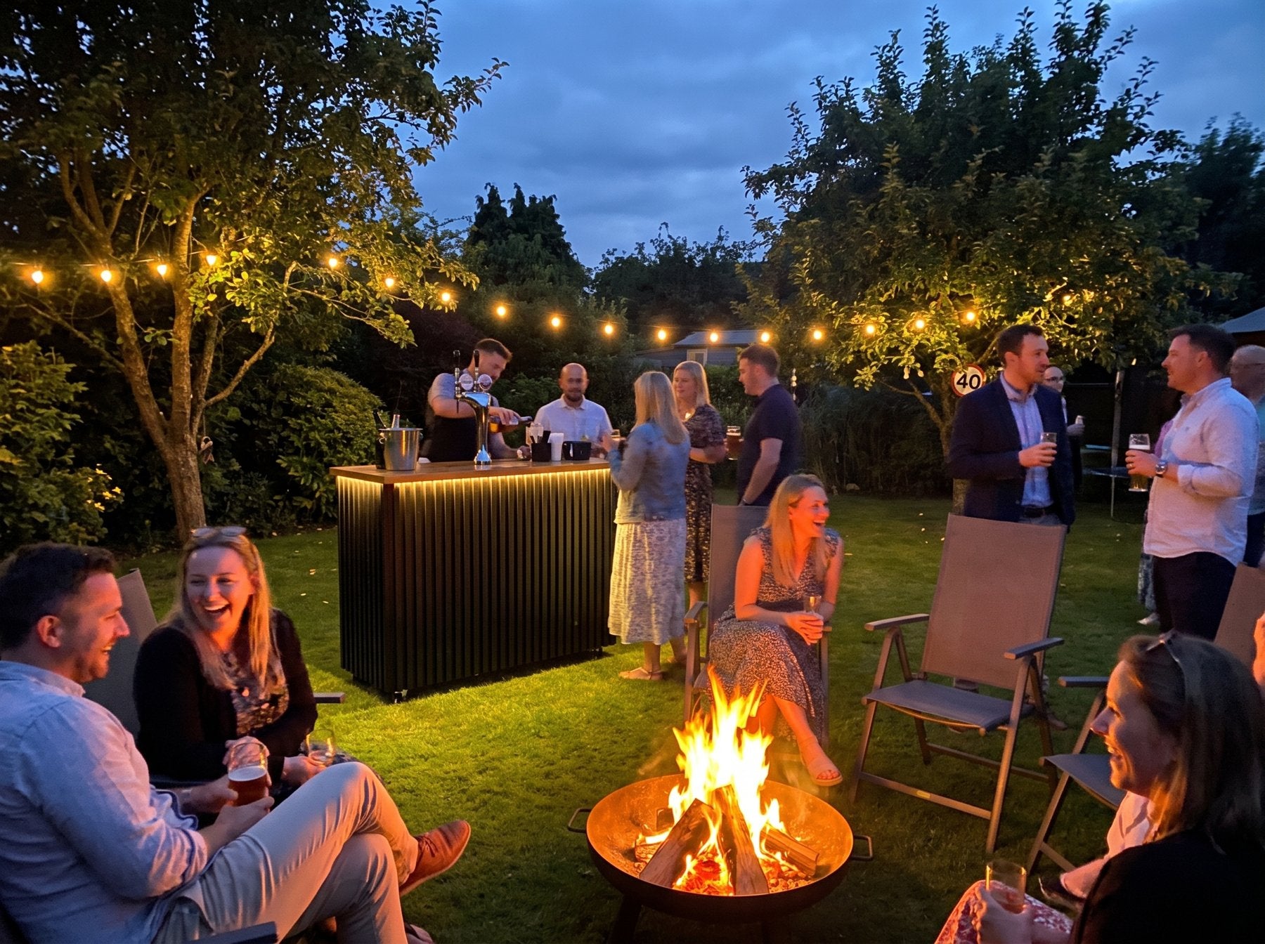 VIVA bar in the evening with firepit