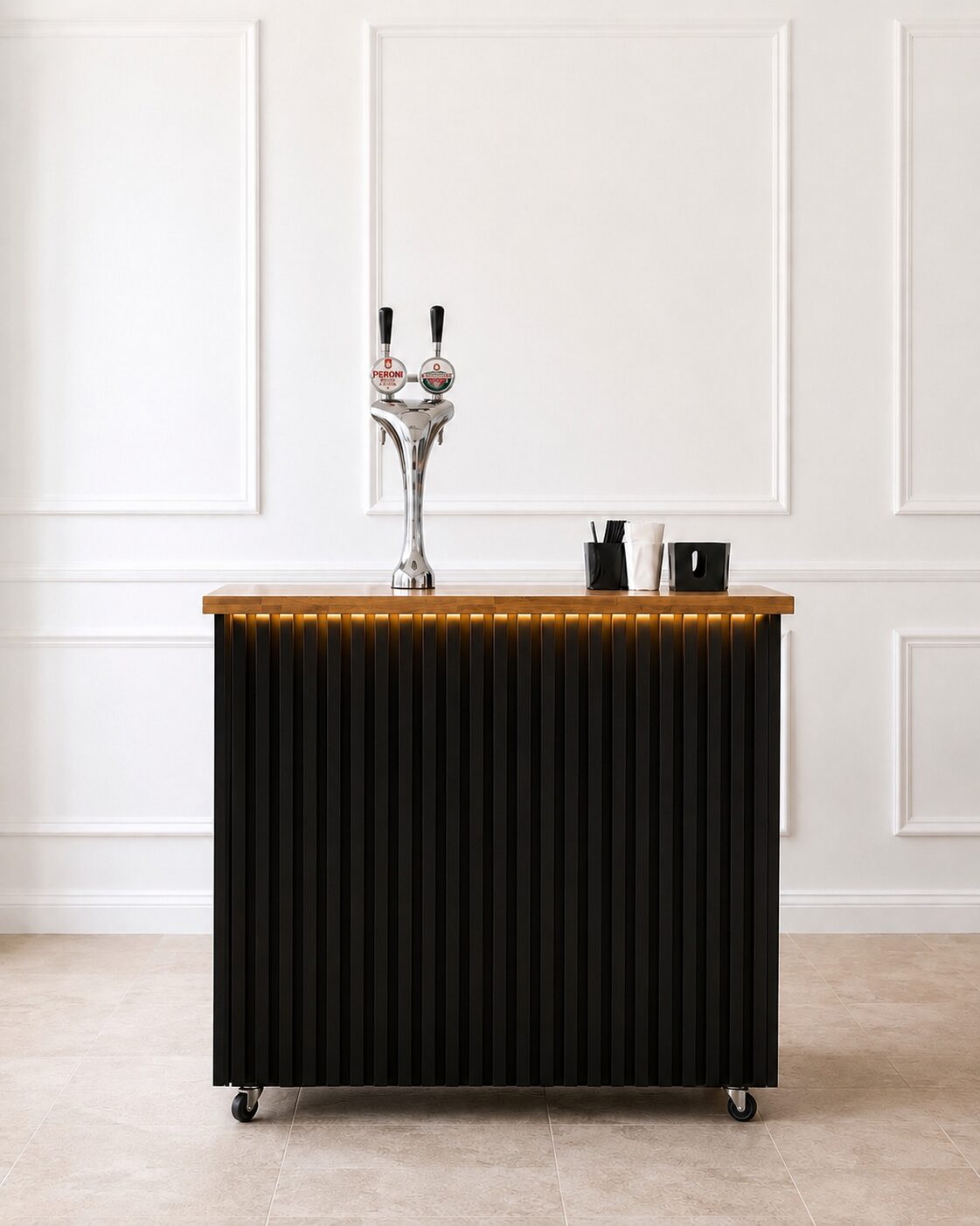 The Mayfair bar — slatted black panel with oak top and warm LED underglow