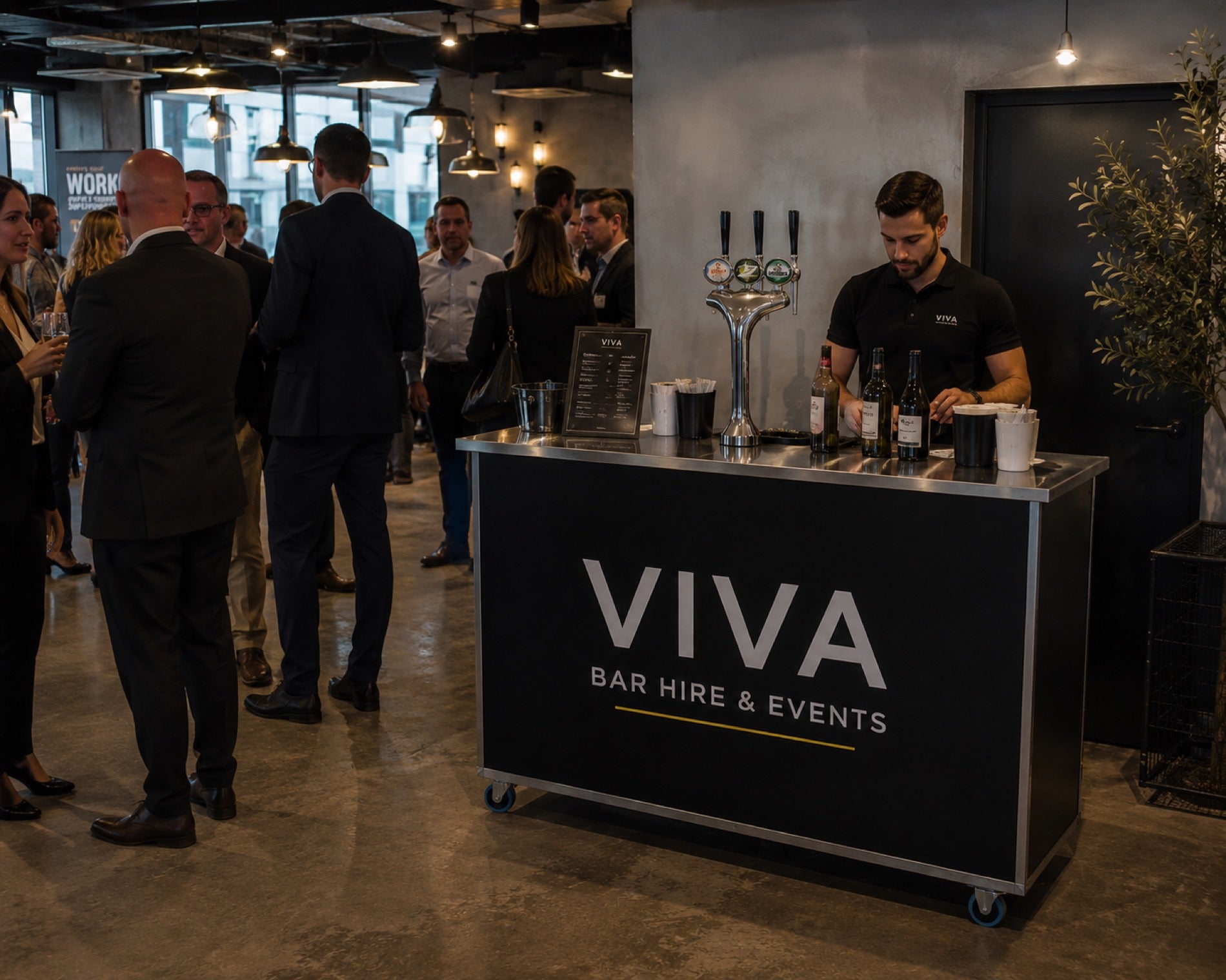 Suited guests at a VIVA bar during a corporate event
