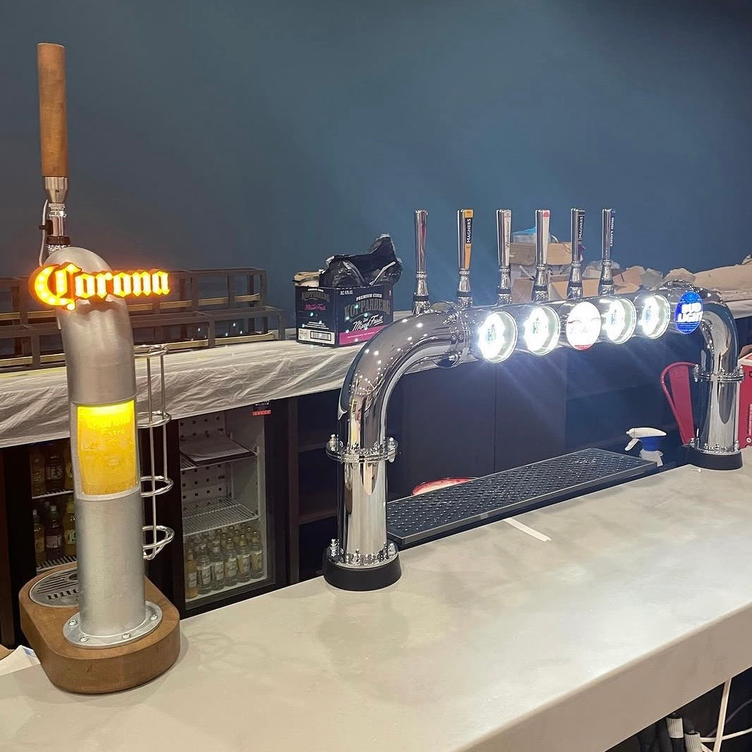 Corona branded font and chrome T-bar installation