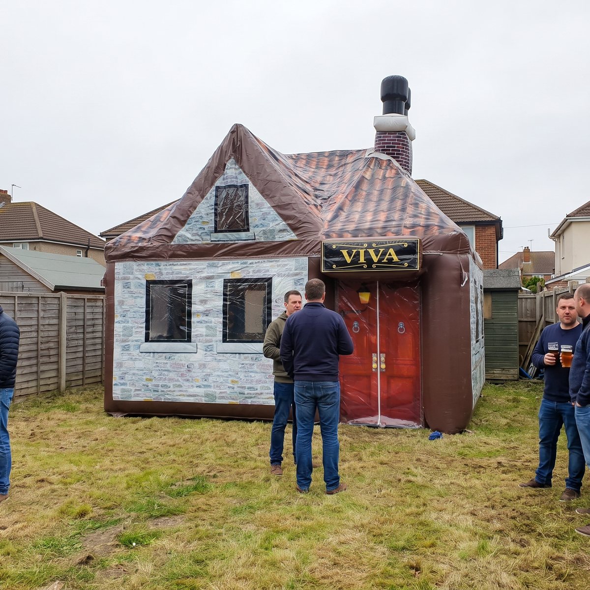 Walk-in inflatable pub at a garden party