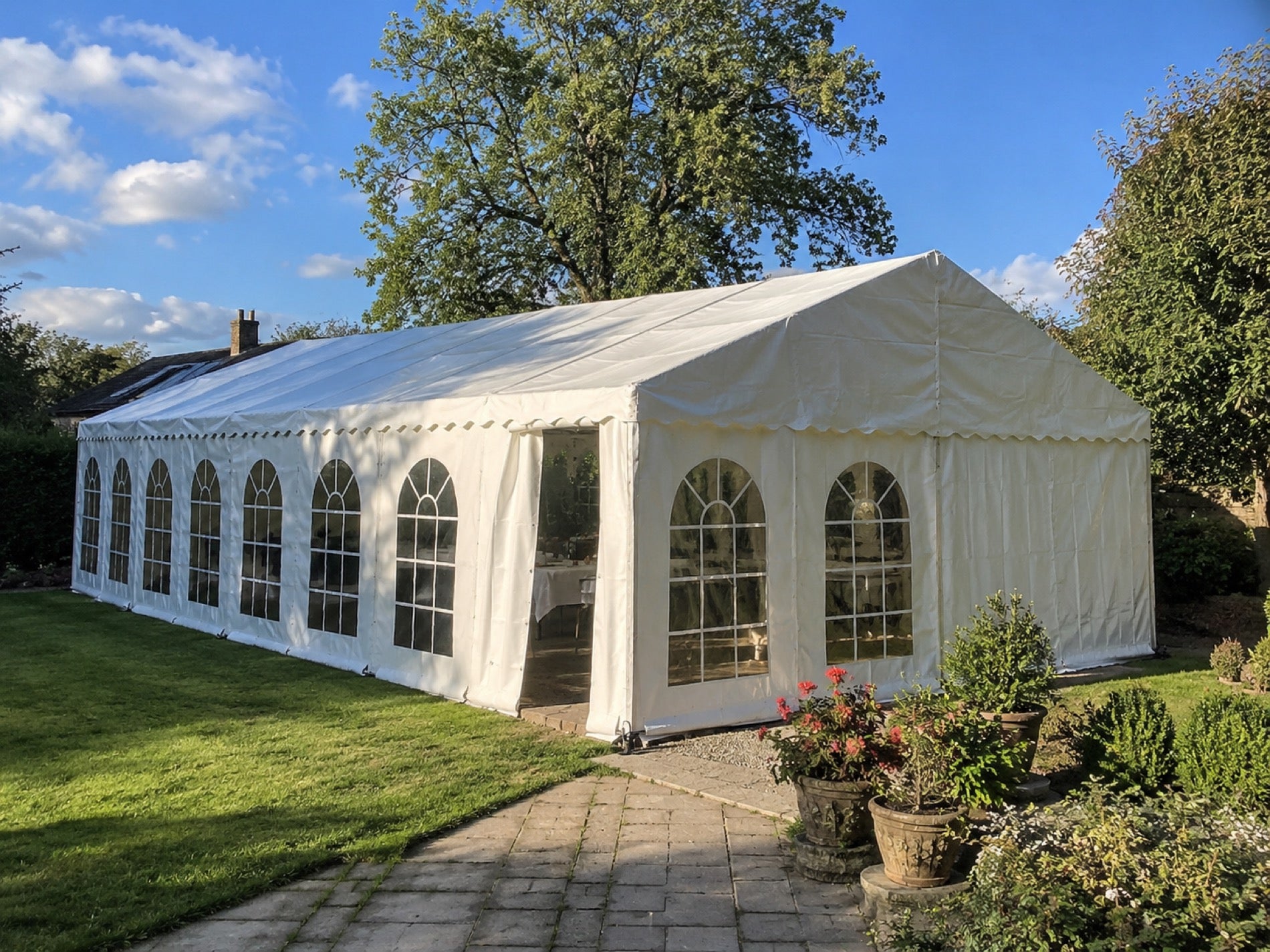The Classic marquee exterior — white frame marquee with arched windows